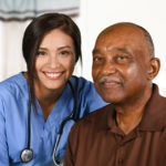 Health Care Worker and Elderly Patient