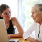 Grandmother and granddaughter.